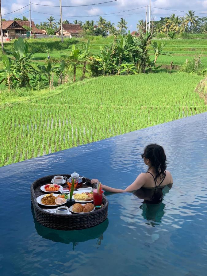 Hotel Umah Tirta à Ubud Extérieur photo
